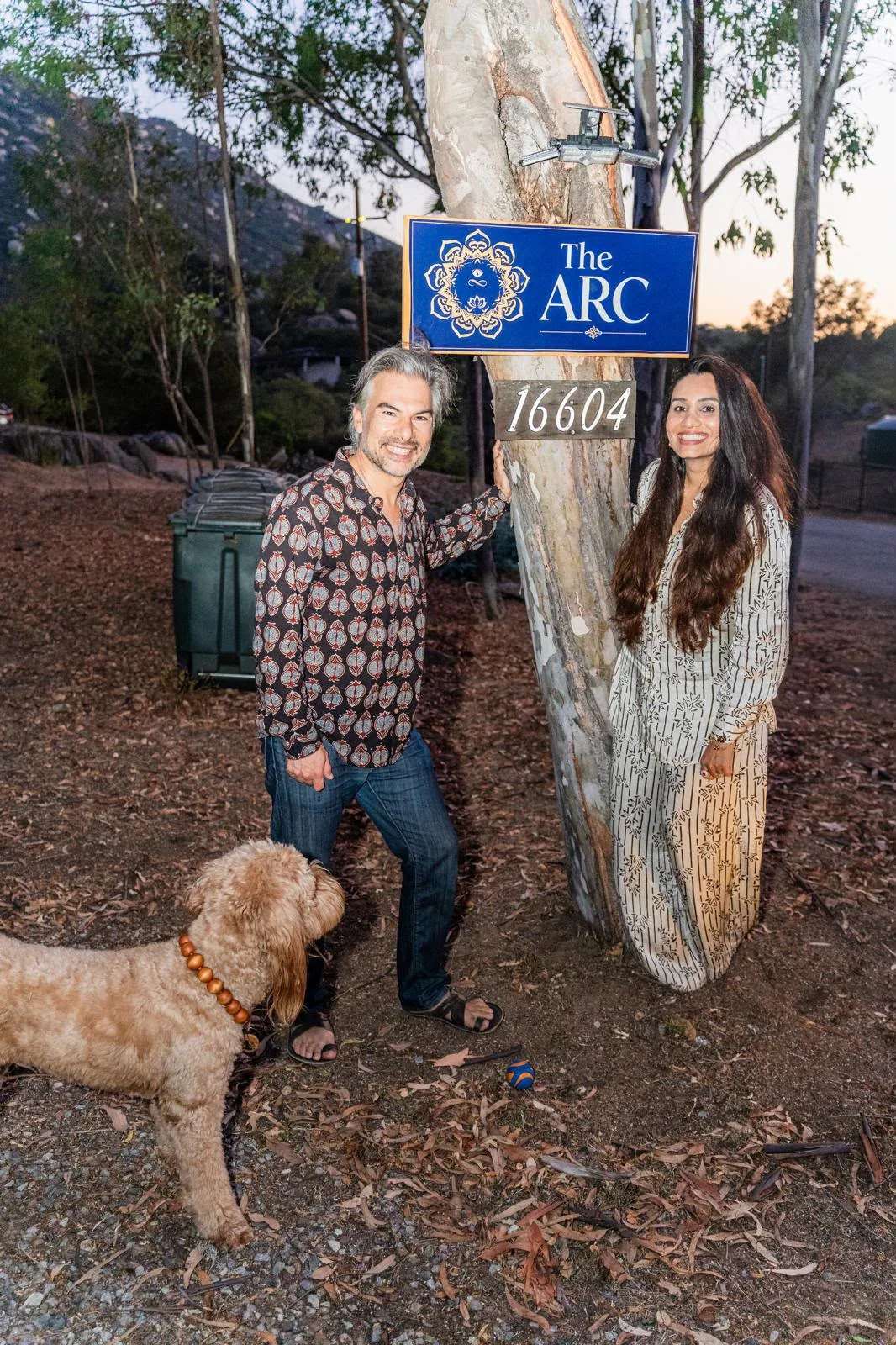 The ARC hosts with Sage beside The ARC welcome sign